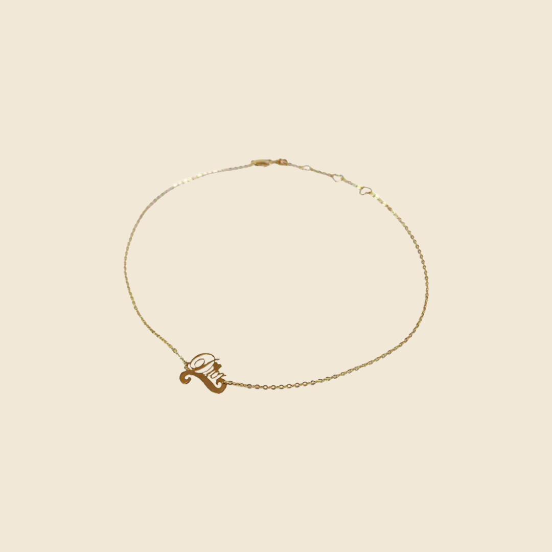 CHRISTIAN DIOR GOLD SCRIPT LOGO CHARM NECKLACE