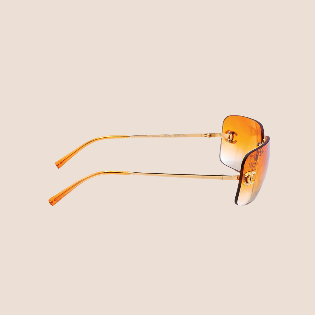 CHANEL 90s ORANGE CRYSTAL CC LOGO RIMLESS SUNGLASSES