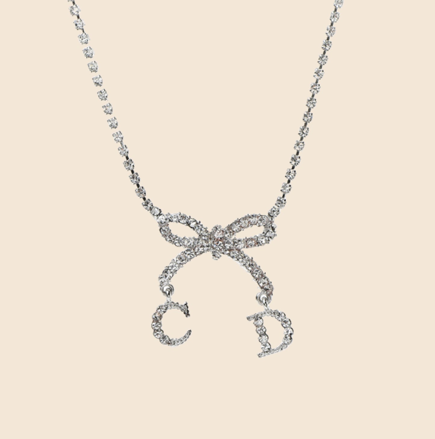 CHRISTIAN DIOR RHINESTONE BOW CD SILVER NECKLACE
