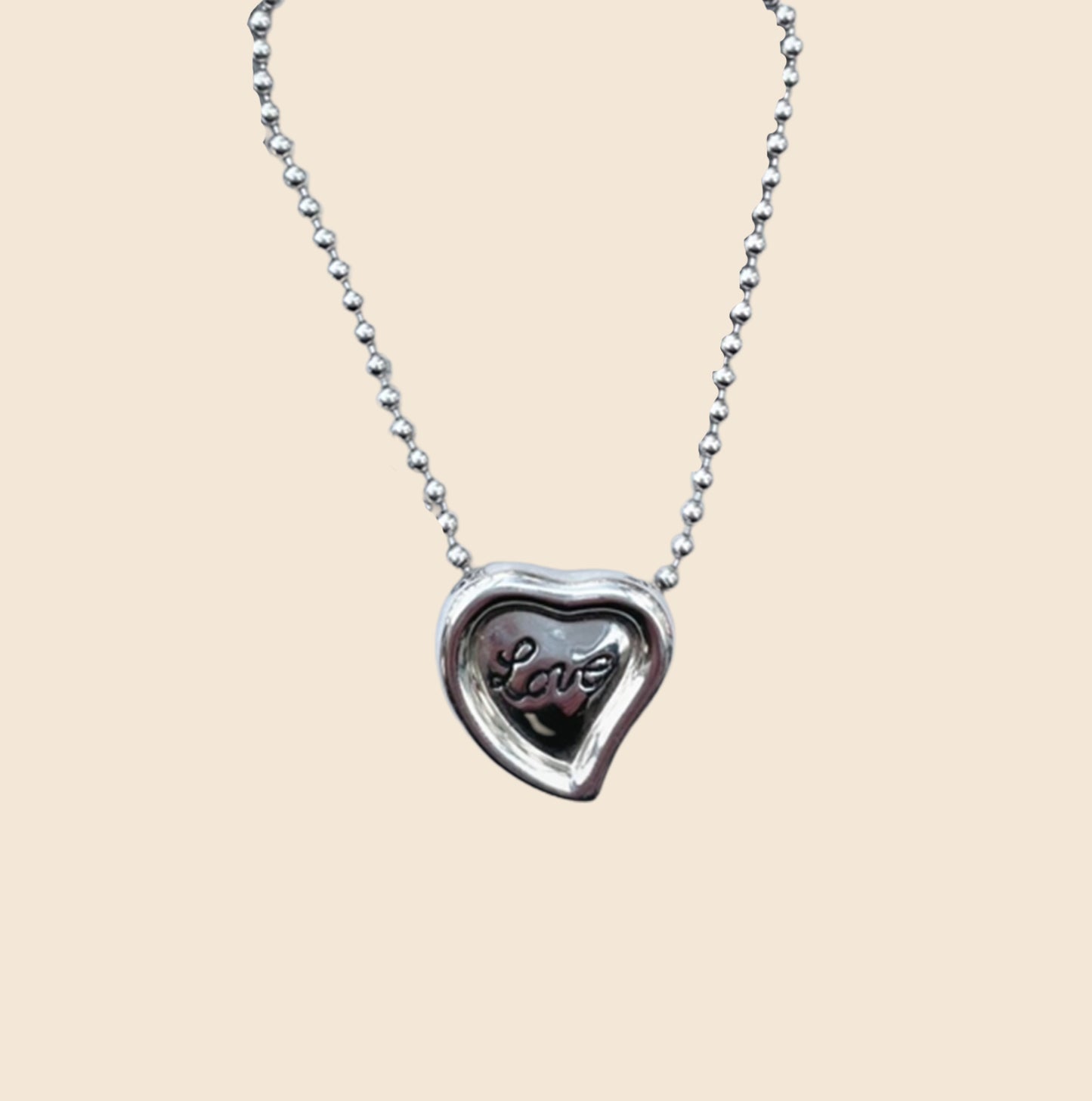 YVES SAINT LAURENT SILVER "LOVE" NECKLACE