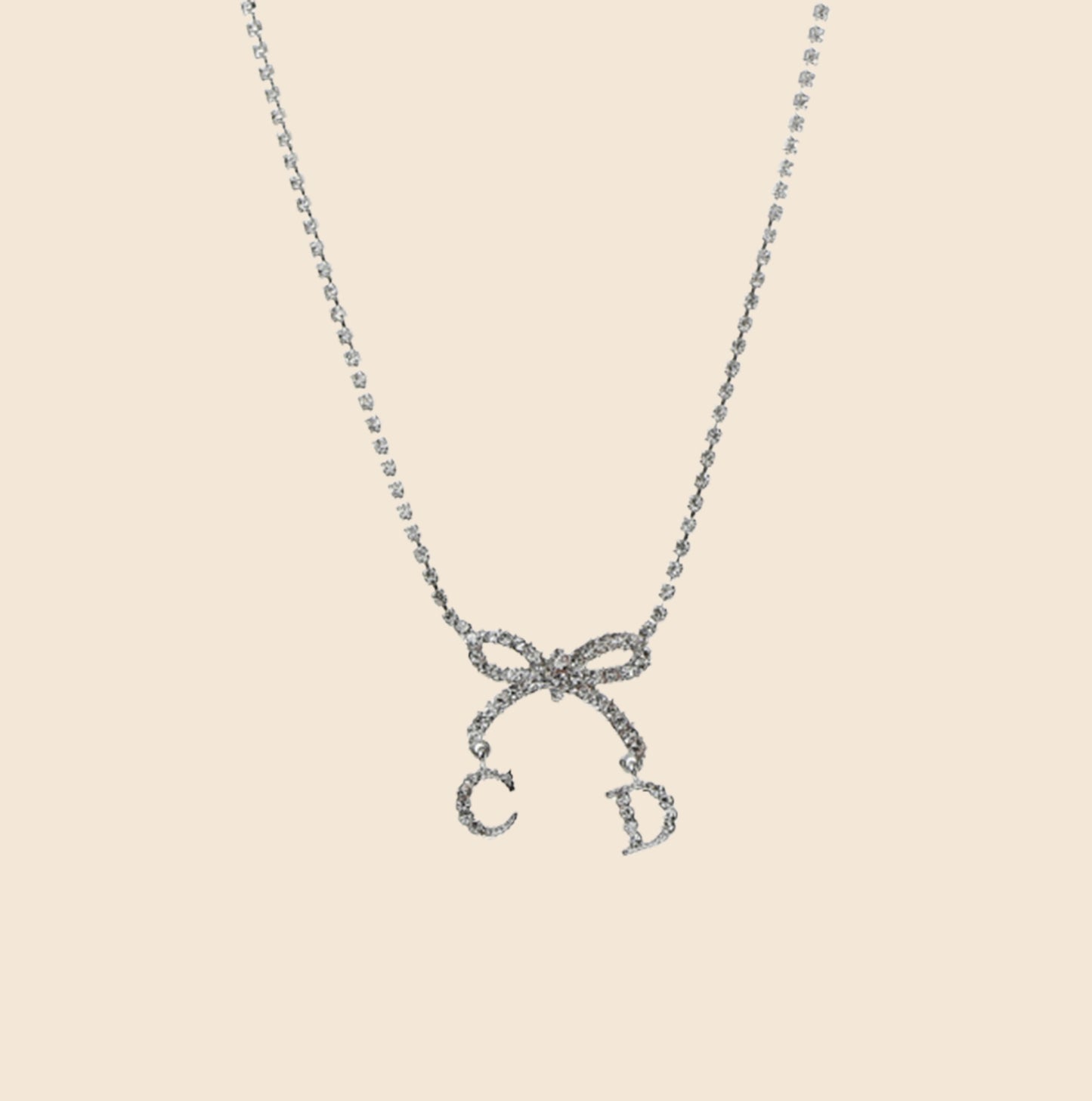 CHRISTIAN DIOR RHINESTONE BOW CD SILVER NECKLACE
