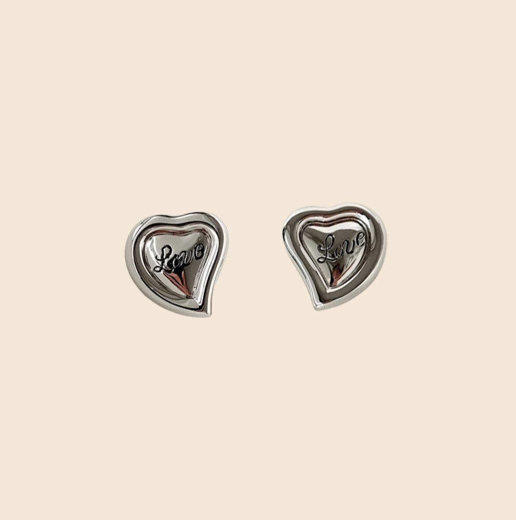 YVES SAINT LAURENT "LOVE" SILVER HEART STUDS