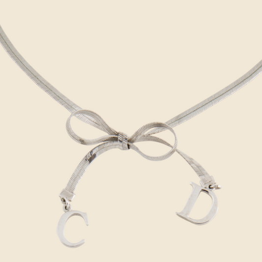 CHRISTIAN DIOR BOW SILVER NECKLACE