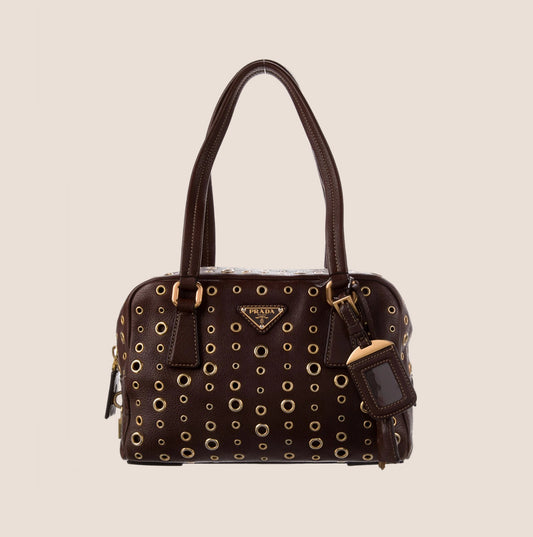 PRADA BROWN LEATHER GROMMET BAULETTO BAG
