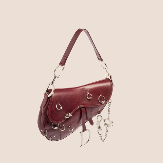 CHRISTIAN DIOR 2004 BURGUNDY LEATHER PIERCED HARDCORE SADDLE BAG