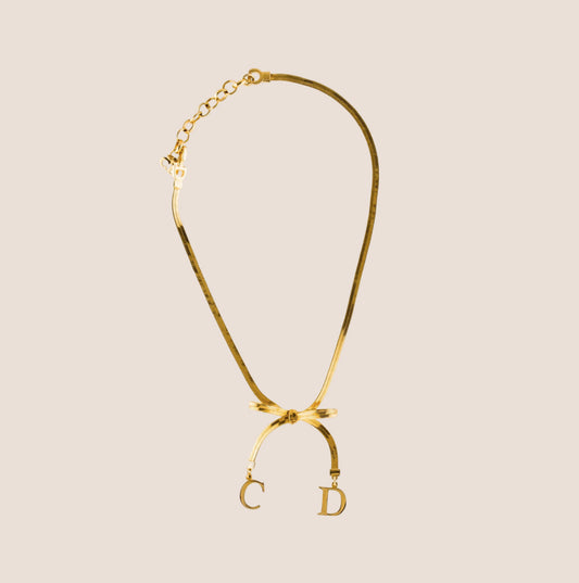 CHRISTIAN DIOR 2000 GOLD  BOW NECKLACE