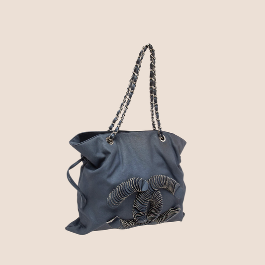 CHANEL BLUE DENIM DRAWSTRING DISCUS TOTE BAG