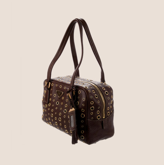 PRADA BROWN LEATHER GROMMET BAULETTO BAG