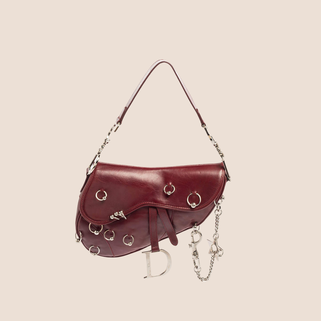 CHRISTIAN DIOR 2004 BURGUNDY LEATHER PIERCED HARDCORE SADDLE BAG