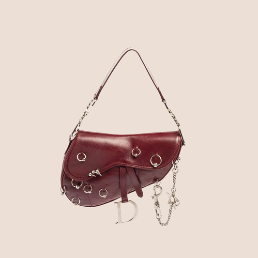 CHRISTIAN DIOR 2004 BURGUNDY LEATHER PIERCED HARDCORE SADDLE BAG