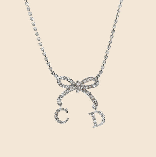 CHRISTIAN DIOR RHINESTONE BOW CD SILVER NECKLACE