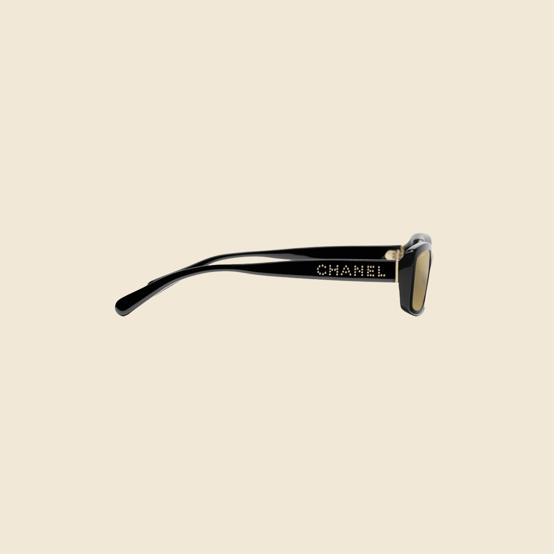 Chanel black top and gold sunglasses