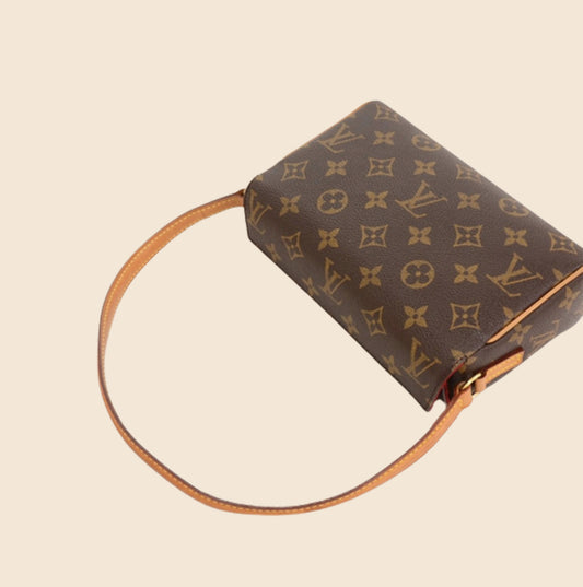 Authentic Louis Vuitton Monogram Coated canvas Segur shoulder bag