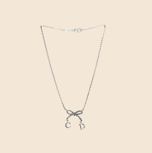 CHRISTIAN DIOR RHINESTONE BOW CD SILVER NECKLACE